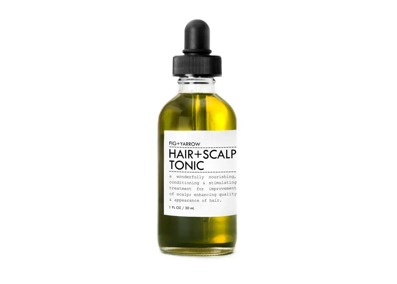 Flasche mit Haar- und Kopfhauttonikum. Die Schafgarbe wirkt pflegend und stimulierend f&uuml;r gesunde Haare.